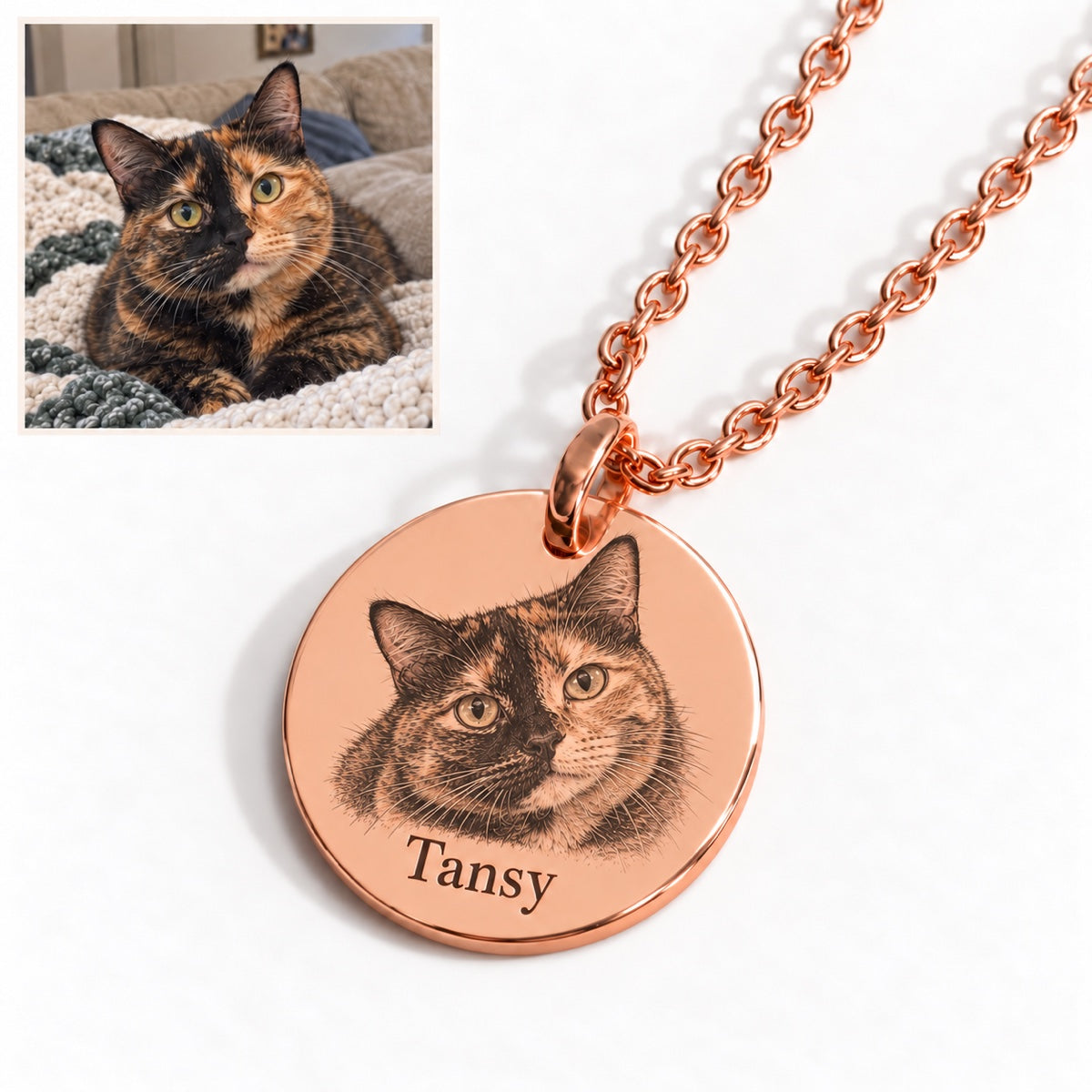 Cat — AI concept: casual indoor phone snapshot of Tansy the tortoiseshell cat above a Rose Gold engraved portrait necklace. Illustrative pet photo, not a customer photo or verified finished product.
