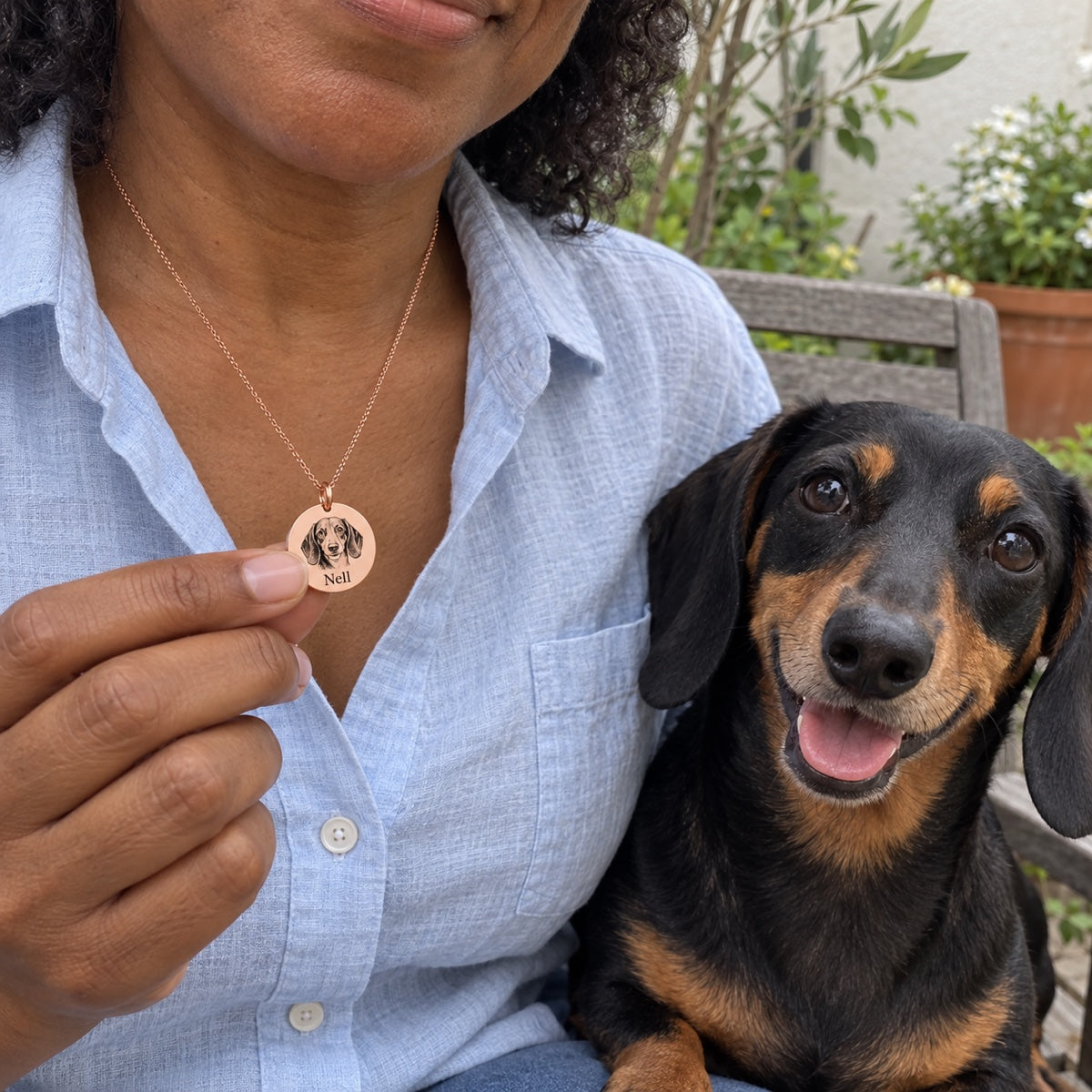 Dog — AI concept: Rose Gold Nell black-and-tan dachshund worn portrait necklace — not a customer photo or verified finished product.